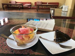fruit salad & banana chocolate cake  at Lhamo's Croissant in Dharamshala