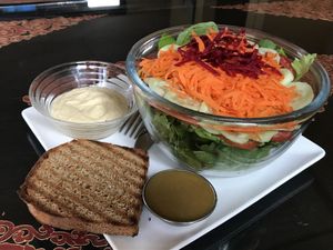 salad with hummus & home made bread  at Lhamo's Croissant in Dharamshala