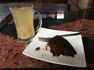 vegan carrot cake & ginger lemon tea  at Lhamo's Croissant in Dharamshala