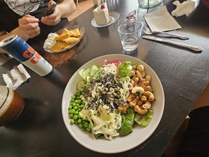 Nudelsallad i förgrunden och pannkakor i bakgrunden. at VeGofika Göteborg in Gothenburg