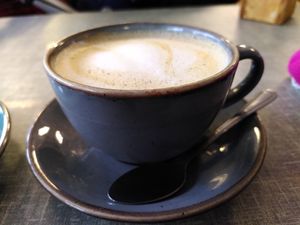 Decaf oat latte (December 2023) at Little Devil's Cafe in Aberystwyth