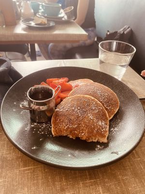 Pancakes with maple syrup and strawberries   at Little Devil's Cafe in Aberystwyth