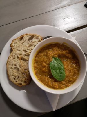 Vegan sweet potato, carrot and coriander soup with sourdough bread at Little Devil's Cafe in Aberystwyth