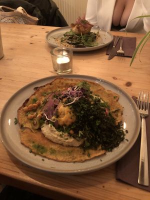 Vegetable pancake with pesto and hummus (mine) and a pastry with mushrooms (pictured in the back)  at VanPlanten in Utrecht