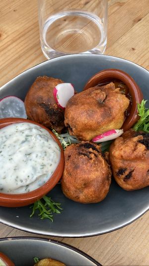 Bondas - potato balls with garam masala spice, served with mango chutney and mint yoghurt! The best of the snacks imo  at VanPlanten in Utrecht