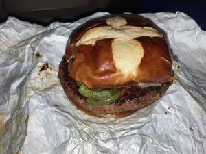Sauerkraut burger + grilled peppers at Vegan Brüder in Fort Lauderdale