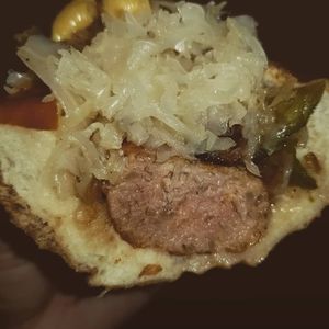 Sausage with sauerkraut at Vegan Brüder in Fort Lauderdale