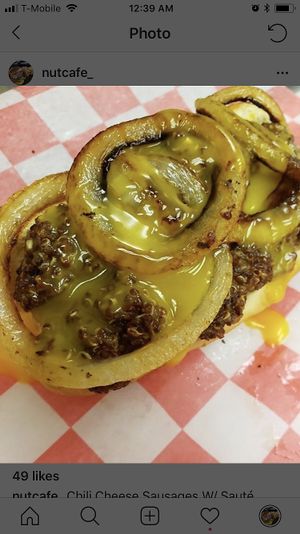 Vegan chili cheese sausage with sautéed onions!  at Nut Cafe in Jonesboro