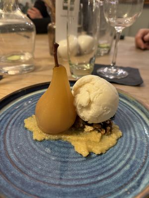 Vanilla poached pear, sweet parsnip puree, candied walnuts and vanilla ice cream   at The Crown Inn in Broughton