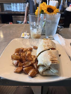 Breakfast Burrito with potatoes  at Milk & Honey in Chattanooga