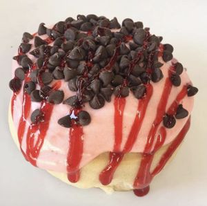Strawberry Frosting with Chocolate Chips & Strawberry Jam at Cinnaholic in Belmont