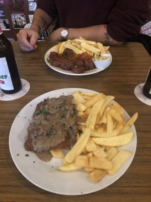 Vegan schnitzel and Currywurst  at Trash Chic in Cologne