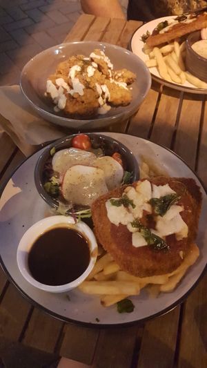 Vegan parmigiana with a side of "wings" at The Kent Hotel in Hamilton