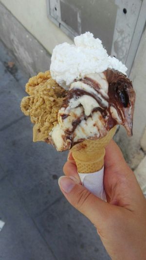 Nutella and coffee ice cream topped with 'panna' at Gelateria Brivido in Rome