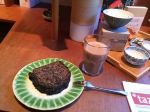 Chai latte and slice with black sesame paste. Both very yummy.  at Tushita in Munich