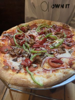 Vegan prospector— the veg cheese, sausage and pepperoni was all so good! Pizza had a lovely crunch too!   at Prospectors Pizza in Denali
