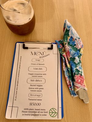 Menu, tamarind water and cloth napkins. 💜  at Ginger Veggie in Puerto Vallarta