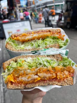 Hash Brown & Cheese Sandwich: multi-grain bread, mayo, lettuce, tomato, hash brown, vegan cheese, ketchup at Spring Cafe in New York City
