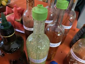 FIVE flavors of house made hot sauce.  at Mandarina in Florianopolis