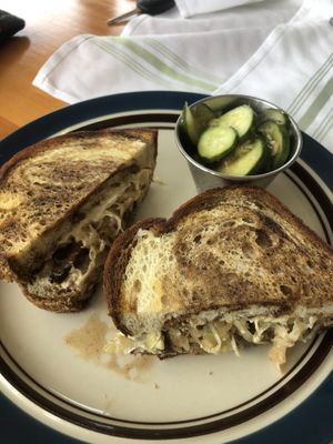 Vegan Reuben sandwich with a side of cucumbers. Very flavorful and delicious!  at Leaf & Lentil in Sarasota