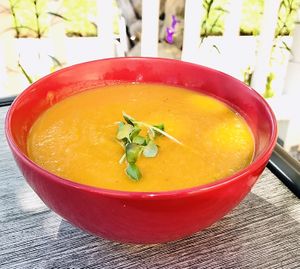 Happy Halloween! Carrot, Apple, Ginger Soup w/Basil Microgreens is the special soup today in honor of this orange themed holiday 🎃🌱 at Leaf & Lentil in Sarasota
