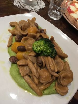 Homemade pasta with tomatoes, olives and broccoli purée  at Terra Rossa in North London