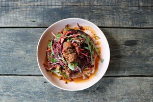 Scallion pancake - crunchy Asian slaw, spiced tempe with a carrot & ginger dressing at Palm Greens in East London