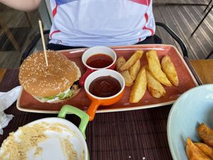 Vegan burger + extra barbecue sauce  at Veggies in Tirana