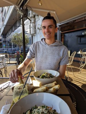 Spring rolls, sushi salad and terrace at Veggies in Tirana