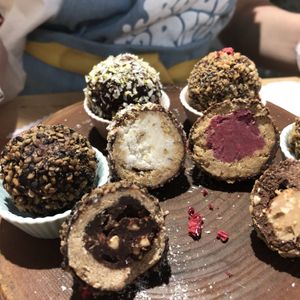 Tahini, coconut-banana-almond, raspberry-peanut, peanut bombs  at Balifornia in Moscow