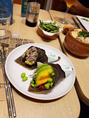 Mushroom + guacamole handroll, mango, tofu, and edamame handroll  at Yasai Natural Sushi in Rio De Janeiro