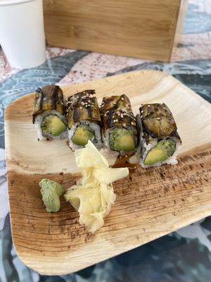 Caterpillar roll - thinly sliced, cooked eggplant with a delicate sauce on top   at Wasabi Beach Sushi & Kitchen in Montauk