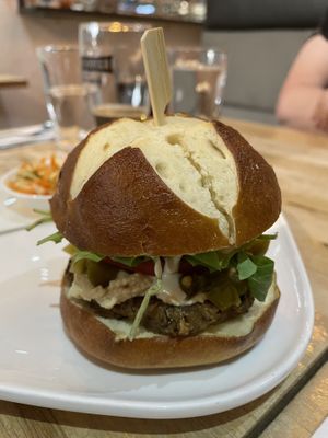 Southern Burger with Pretzel Bun  at Nourishmoi in Mississauga