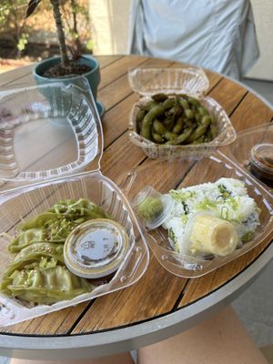 Double crunch roll, garlic edamame, and veggie gyoza  at Sushi Lounge in San Diego