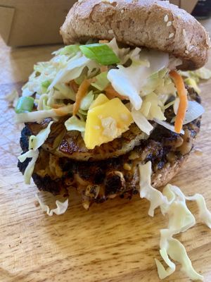 Teriyaki burger with seared pineapple ring and mango slaw at Veggie Thumper - Food Truck in Des Moines