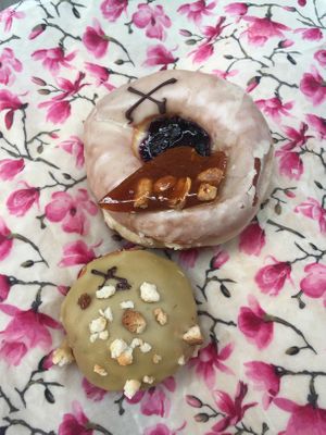 Peanut brittle and blueberry, sour cherry and pistachio  at Crosstown Doughnuts - Cannon St in London