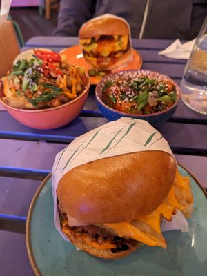 Kimchi burger, chilli cheese burger, Thai tots and sweet and sour balls at Wholesome Junkies in Manchester