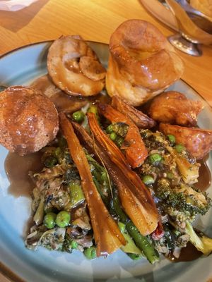 Sunday roast with beef, gravy poured on.   at Wholesome Junkies in Manchester