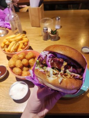 Chicken burger and tots at Wholesome Junkies in Manchester