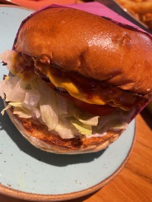 Classic burger with onion rings #customised   at Wholesome Junkies in Manchester