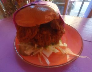 CHIKN SANDWICH - CRISPY FRIED OYSTER MUSHROOMS, LETTUCE, PICKLES  & BUFFALO SAUCE at Wholesome Junkies in Manchester