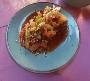 TRUFFLE GYOZAS -
GRILLED GYOZAS, TRUFFLE OIL, PARSLEY,
TRUFFLE MAYO, SPRING ONION, STICKY SOY DIP & FURIKAKE at Wholesome Junkies in Manchester