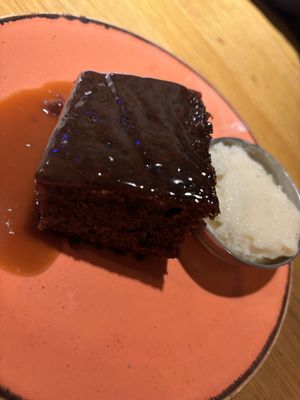 Sticky toffee pudding with ice cream   at Wholesome Junkies in Manchester