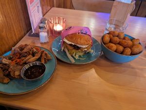 Salt and pepper wings, truffle burger and tater tots at Wholesome Junkies in Manchester
