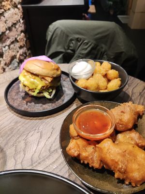 Sweet and sour chicken, burger and tots at Wholesome Junkies in Manchester