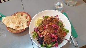 Couscous  salad served with flatbread at Le Daily Syrien Veggie in Paris