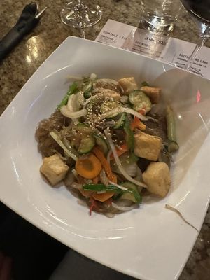 Tofu with rice noodles  at 929 Kitchen & Bar in Columbia