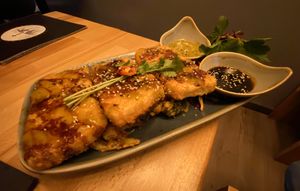 Fried Tofu (Steak) with fried vegetables underneath  at Moon in Berlin