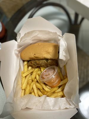 Un Chicken sandwich with fries  at Vegan On The Go in Oakland Park