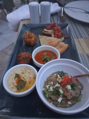 Hummus, eggplant salad, harissa, falafel, fennel pies and bruschettas at Avocado in Crete